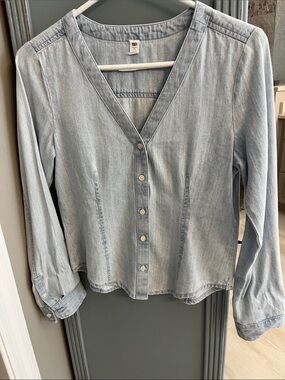 BP brand Light Blue Denim Button-Front V-Neck Shirt with button cuffed sleeves.